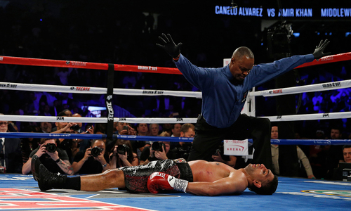 Alvarez knocks Amir Khan out to retain WBC middleweight title Alvarez knocks Amir Khan out to retain WBC middleweight title