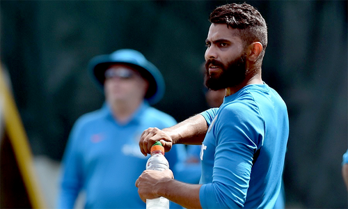 Ravindra Jadeja in trouble for clicking pictures with endangered lions Ravindra Jadeja in trouble for clicking pictures with endangered lions