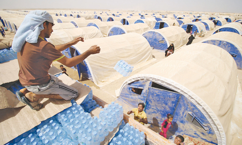 Families from Fallujah flee one hell to find another