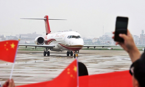 Made in China plane makes first commercial flight Made in China plane makes first commercial flight
