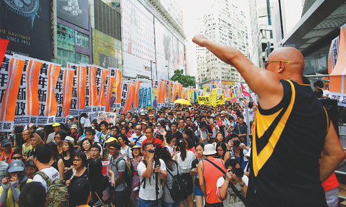 Protesters rally in Hong Kong on handover anniversary