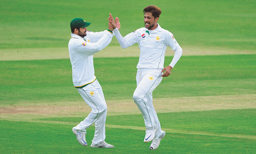 Amir marks return to England in style