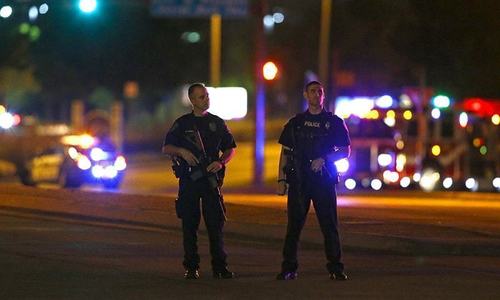 US police shoot autistic man's black caretaker as he lies in street US police shoot autistic man's black caretaker as he lies in street