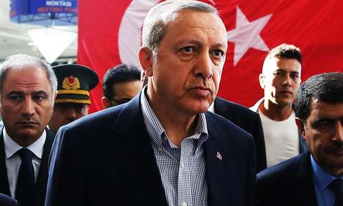 Turkey targets media after coup as Erdogan meets opposition
