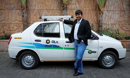 India ride-hailing firm Ola sideswiped as Uber, Didi team up in China