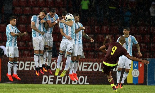 Messi-less Argentina fight back to deny Venezuela