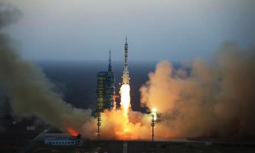 China launches manned mission to experimental space station China launches manned mission to experimental space station