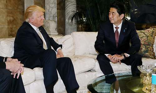 Japan's PM Abe meets Trump, says confident can build trust