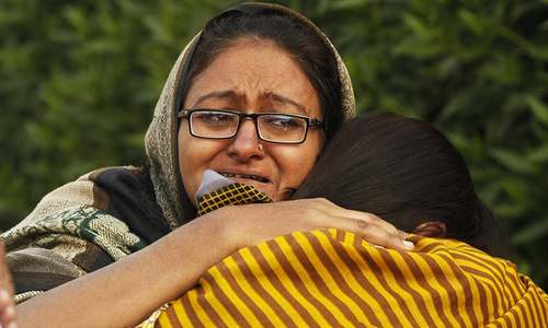 In pictures: Fire at Regent Plaza hotel leaves 11 dead