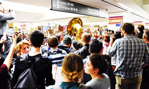 Protests erupt at US airports following Trump travel ban