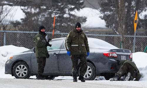 Quebec mosque shooting suspect surrenders to police