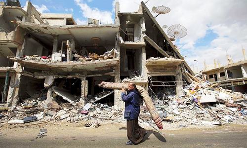 Dozens dead in suicide attack in Syria's Homs