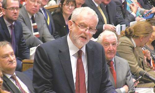 British lawmakers back May, set for snap election