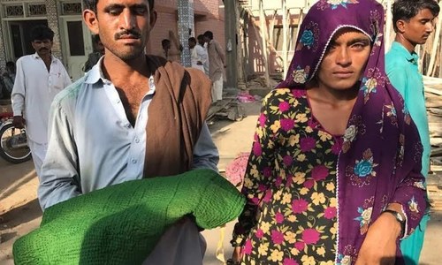 Parents protest against Thar deaths carrying bodies of children