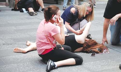Car slams into pedestrians at NY Times Square, kills one