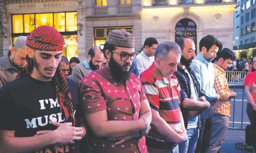 100 Muslims break fast, offer prayers near Trump Tower 100 Muslims break fast, offer prayers near Trump Tower