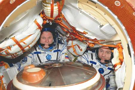 Astronauts return after marathon ISS mission