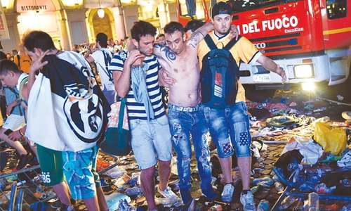 Stampede triggered by bomb scare leaves 1,500 injured in Italian town