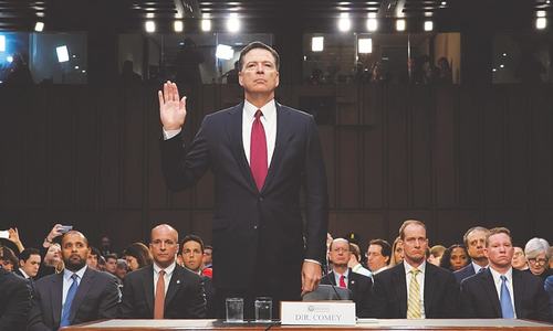 Comey says he was fired for probing Russian meddling in US elections