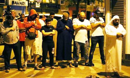 One killed as vehicle rams worshippers near London mosque