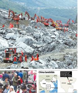 Hopes dim in search for 93 missing in China landslide