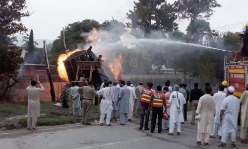 Six burnt to death after truck crashes into van