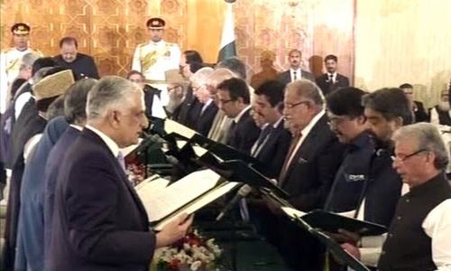 Cabinet members take oath at the ceremony in the Presidency.— DawnNews