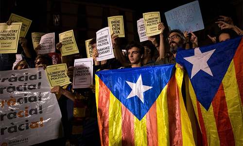 Senior separatists detained as Madrid piles pressure on Catalonia