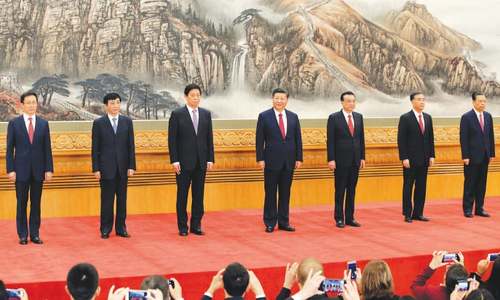 Xi unveils new leaders, but no obvious successor Xi unveils new leaders, but no obvious successor