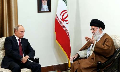 Iran's supreme leader Ayatollah Ali Khamenei holds talks with Russian president Vladimir Putin in Tehran.─AFP