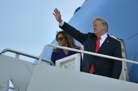 Trump leaves for Asia with heavy domestic baggage