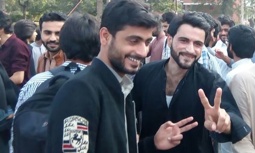 QAU students end protest after university restores expelled students