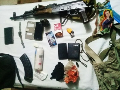 Firearms and other items discovered from Taukali's possession. —ISPR