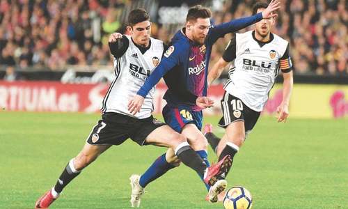 Barca salvage draw at Valencia after Messi ghost goal controversy