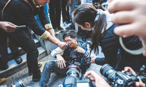 Anti-Beijing protesters march in Hong Kong Anti-Beijing protesters march in Hong Kong