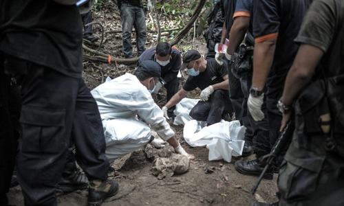 Suu Kyi claims military's investigation of Rohingya mass grave a 'positive step'