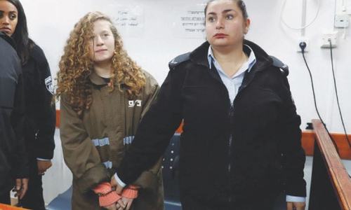 Palestinian teen's military trial for slapping Israeli soldiers delayed