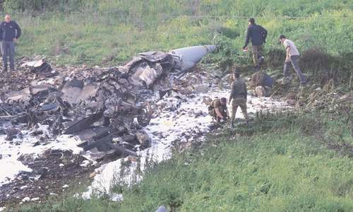 Israeli jet shot down after bombing Iranian site in Syria