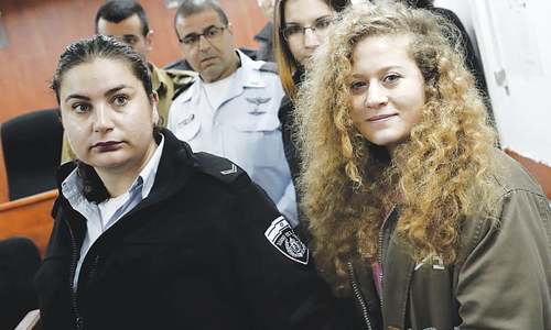 Military trial of Palestinian teen protest icon Ahed Tamimi opens behind closed doors
