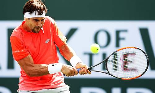 Tennis: Federer takes care of business, Djokovic crashes out