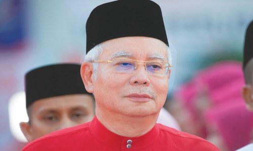 Malaysia bars scandal-ridden ex-leader Najib Razak from leaving country