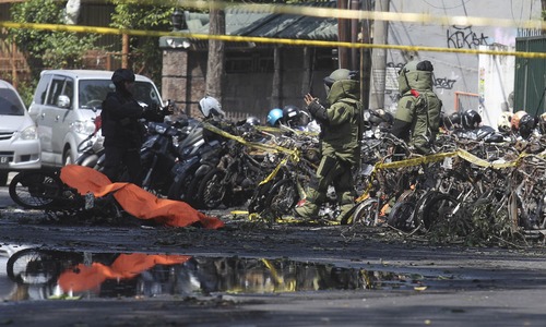 At least 13 dead, 41 hurt as suicide bombers hit Indonesian churches