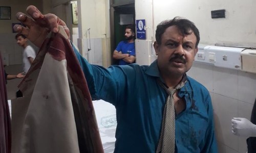 Journalist Asad Kharal beaten up by masked men in Lahore