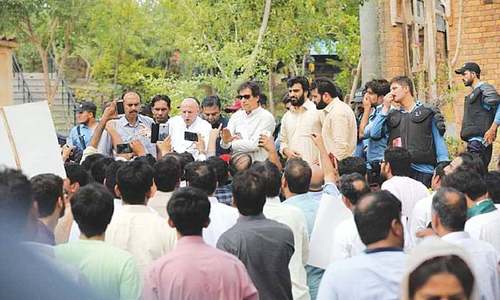 PTI workers stage sit-in outside Banigala as Khan gets a taste of his own medicine