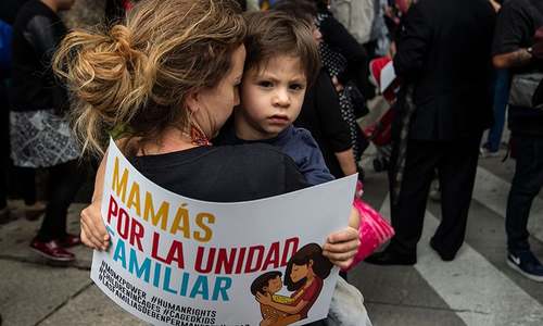 Confusion swirls on border after Trump reversal on families