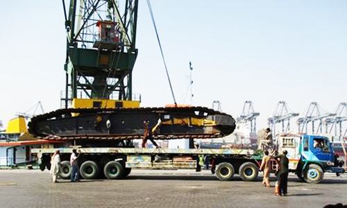 Imports of machinery falling, oil surge