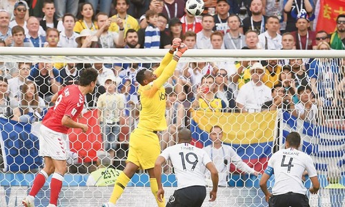 Goalless draw sees Denmark join France in last 16