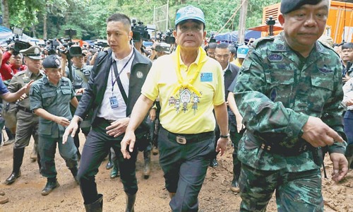 Hope flutters as divers find possible opening to rescue Thai children
