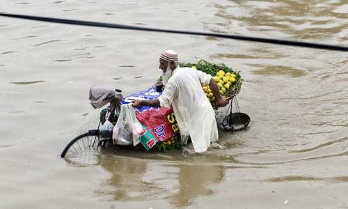 In pictures: Heavy downpour causes streets to flood in Lahore