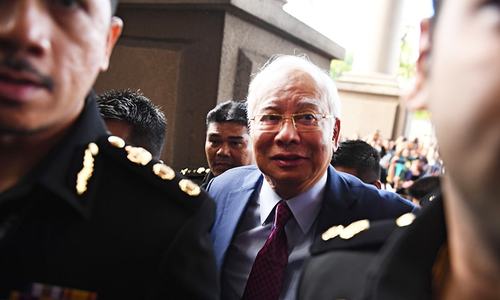 Malaysian court charges former premier Najib with corruption